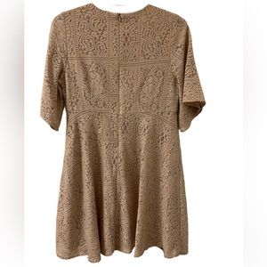 Zara size M , color Tan 
Used and good condition